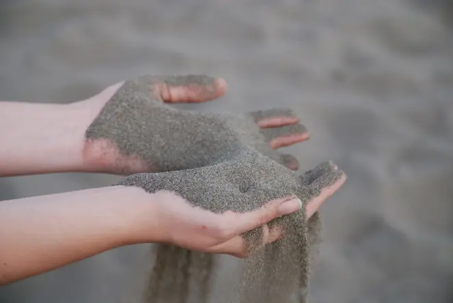 Spreading sand