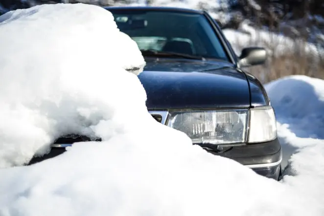 Brushing off snow