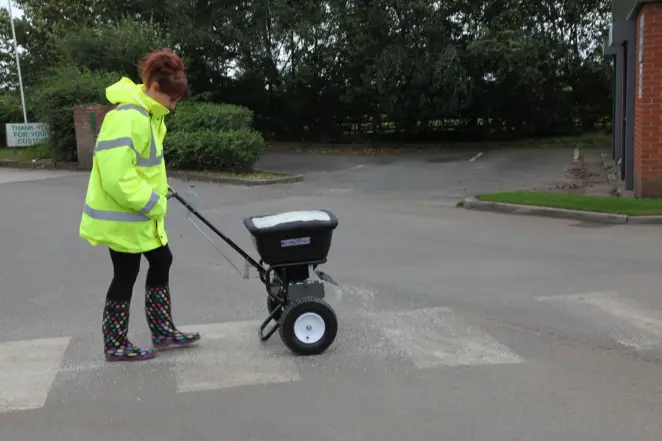 Spreading salt for de icing